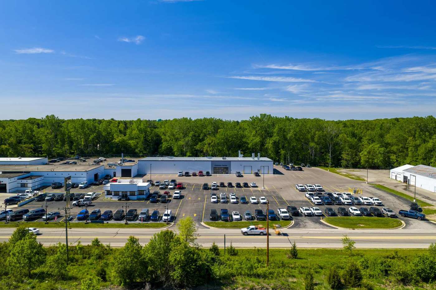Aerial view of the Jim Winter Automotive Group campus and Collision Center on W. Michigan Ave in Jackson, Michigan